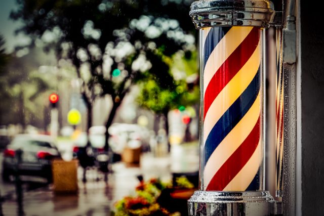 Rain collecting on a barber shop pole in southern California.