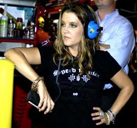 Lisa Marie Presley at a car race.