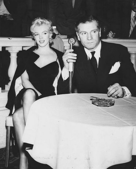 Marilyn Monroe and Laurence Olivier at a press conference announcing their partnership.
