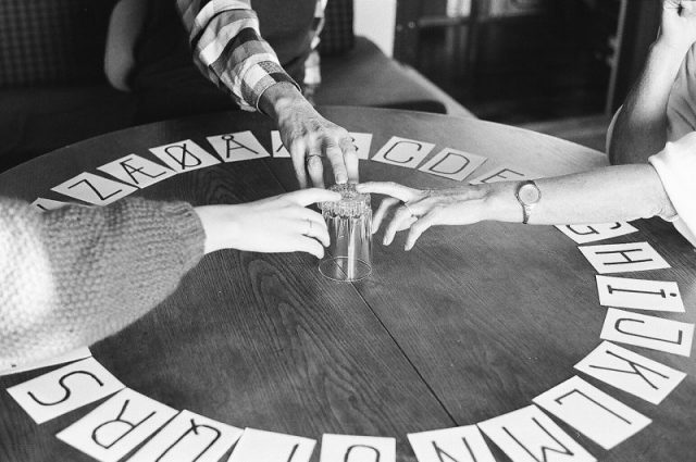 Reconstructing a version of the Ouija board, 1987. Photo by Dialog Center Images CC BY 2.0
