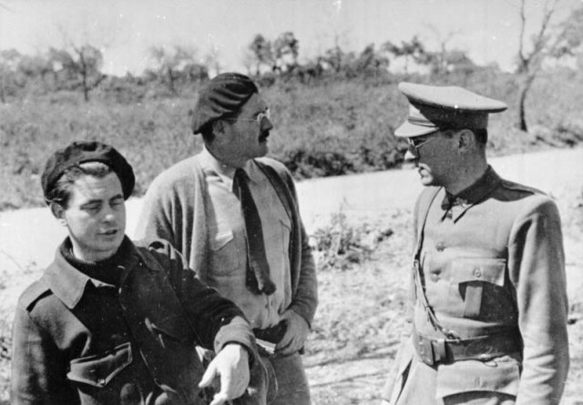 Hemingway (center) with Dutch filmmaker Joris Ivens and German writer Ludwig Renn (serving as an International Brigades officer) in Spain during Spanish Civil War, 1937 Bundesarchiv, Bild 183-84600-0001 / Unknown / CC-BY-SA 3.0