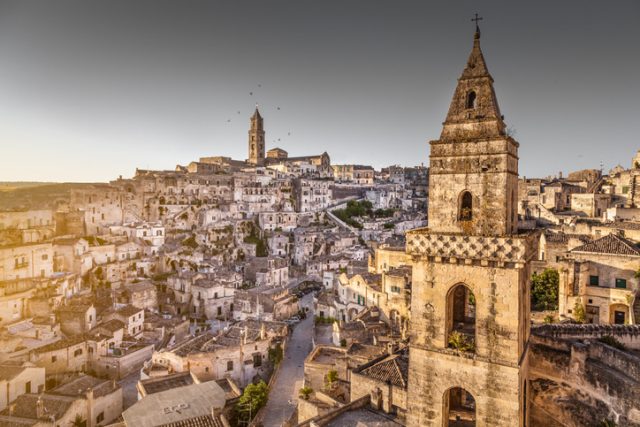 Ancient town of Matera (Sassi di Matera), European Capital of Culture 2019, in beautiful golden morning light, Basilicata, southern Italy.