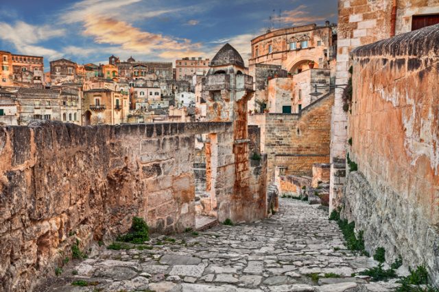 Grottole, Matera, Basilicata, Italy: picturesque view at sunrise of an ancient alley in the old town “sassi di Matera”, European Capital of Culture 2019.