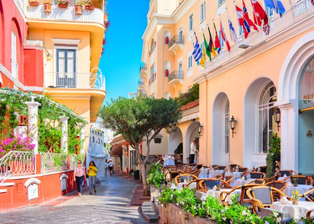 October 3, 2017: Tourists at Street cafes on Capri Island, Italy.