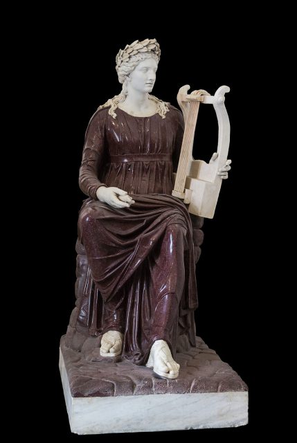 Apollo seated with lyre. Porphyry and marble, 2nd century AD. Farnese collection, Naples, Italy.
