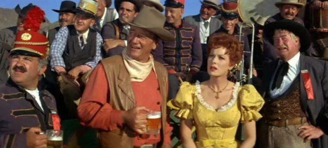 Jack Kruschen, John Wayne, Maureen O’Hara, and Wills in McLintock! (1963)