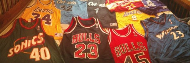 A sports fan’s collection of NBA basketball jerseys. Photo by Cdog91 CC BY SA 4.0