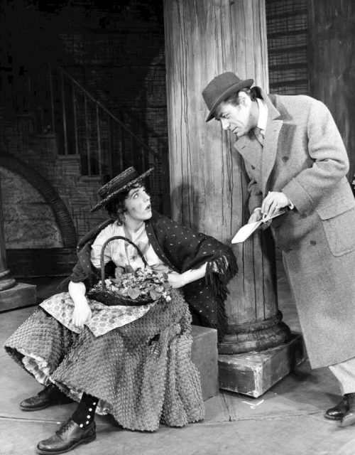 Photo of Julie Andrews and Rex Harrison from My Fair Lady. Eliza Doolittle, the flower girl, meets Professor Henry Higgins.