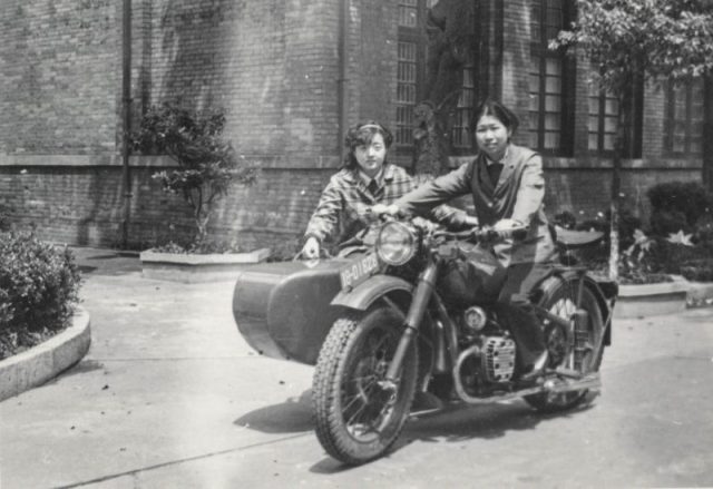 Two Chinese women riding a motorcycle with sidecar Photo by simpleinsomnia CC BY 2.0