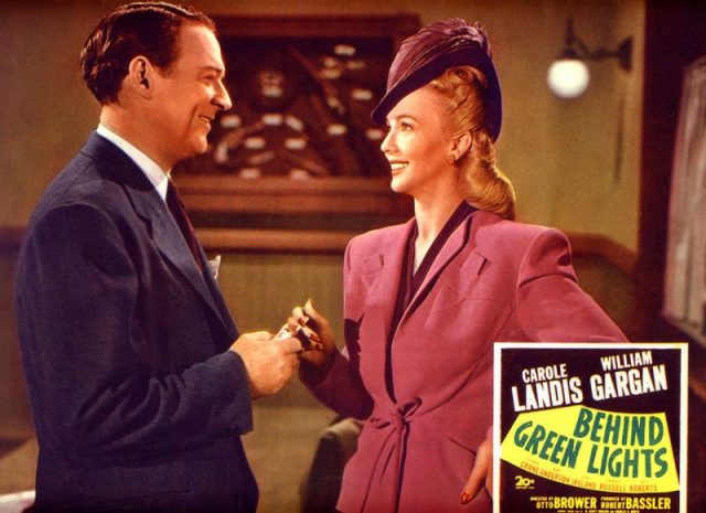 William Gargan & Carole Landis in Behind Green Lights.