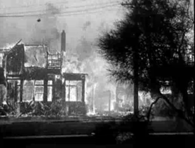A frame from this newsreel of the October 17, 1923 fire in Berkeley, California, which wiped out 650 homes before the wind turned and saved both the town and the university. The newsreel is from the Perlinger Archives in the Internet Archive. Photo by Doc Searls CC BY SA 2.0