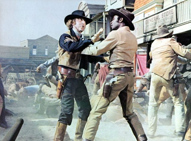Gene Wilder gets into an altercation with Cleavon Little in a scene from the film ‘Blazing Saddles’ (1974). Photo by Warner Brothers/Getty Images