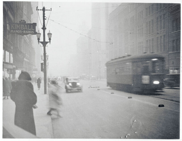 Dust swirls in a downtown scene