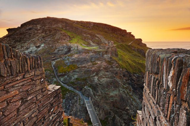 Rugged Tintagel with castle remains, Cornwall, landscape at sunset.