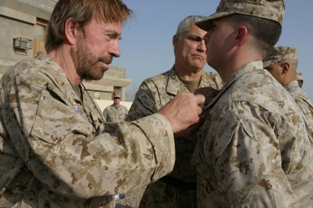 Chuck Norris during a promotion ceremony at Camp Taqaddum in the Al Anbar province of Iraq on November 2, 2006