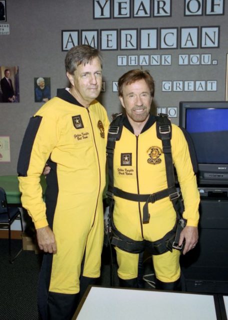 Brit Hume and Chuck Norris pose in the George Bush Presidential Library Classroom in College Station, Texas, at President Bush’s 80th birthday celebration.