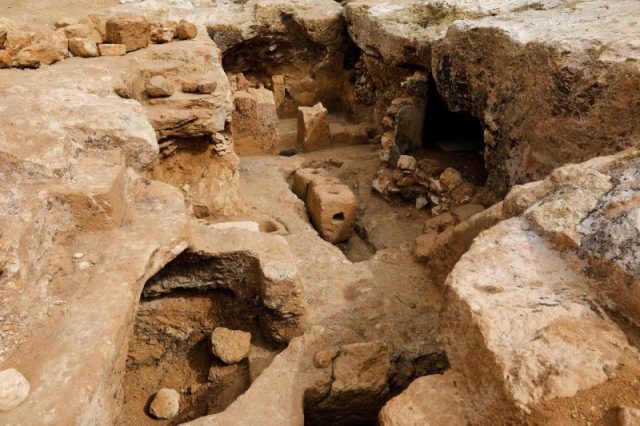 A picture taken on March 27, 2019 shows weight stones that were part of an ancient olive press at the site of the remains of a Jewish village from the Hasmonean period (approximately 2000-years-old), which are currently being uncovered by the Israel Antiquities Authority (IAA) Photo by MENAHEM KAHANA / AFP Getty Images
