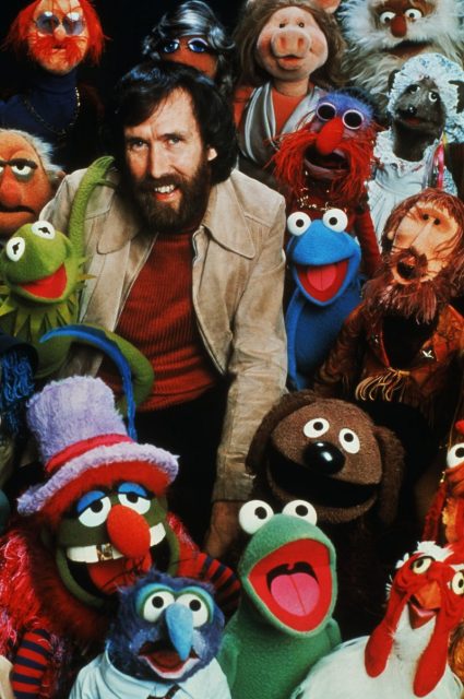 Jim Henson Posing with His Creation Characters