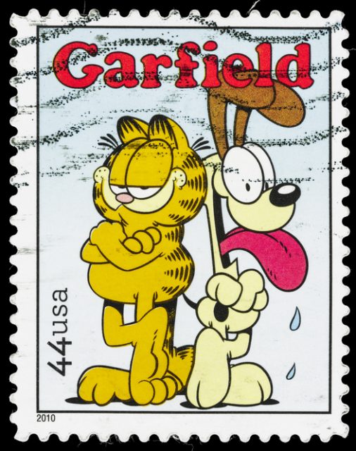 A 2010 USA postage stamp with an illustration of the title character of the comic strip Garfield, along with Odie the beagle