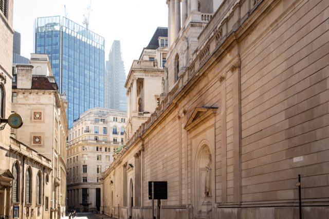 London’s Financial area with new architecture style on the horizon sitting amongst older Georgian architecture.