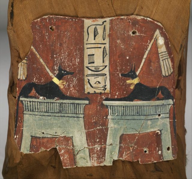 Mummy of Nesmin with plant wreath, mummy mask and other cartonnage elements, Metropolitan Museum of Art, New York