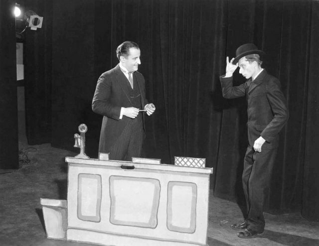 Photograph of Allan Tower (Electric Company Manager) and Norman Lloyd (Consumer) in the Federal Theater Project production of ‘Power’, a Living Newspaper play at the Ritz Theatre (February–August 1937)