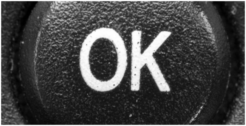 An OK button on a remote control. Photo by Maximilian Schönherr CC BY-SA 3.0