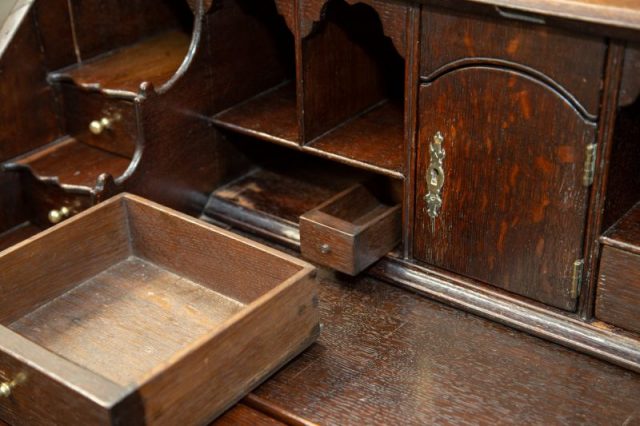 The secret drawer behind this visible drawer. Photo courtesy of Hansons Auctioneers