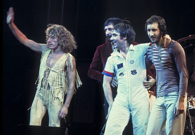 The Who, original line up, performing in Chicago. Left to right: Roger Daltrey, John Entwistle, Keith Moon, Pete Townshend. Photo by Jim Summaria CC BY SA 3.0