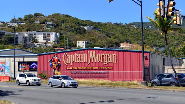 Captain Morgan, Brugal rum and Coors Light signs displayed on buildings in Charlotte Amalie, St. Thomas, US Virgin Islands