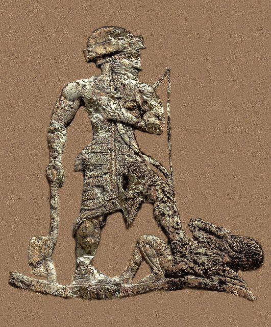 King Anubanini of Lullubi, holding an axe and a bow, trampling a foe. Anubanini rock relief, circa 2300-2000 BC. Sar-I Pul, Iran. Photo by Koorosh Nozad Tehrani CC BY-SA 2.0