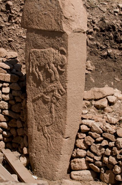Pillar 2 from Enclosure A (Layer III) with low reliefs of what are believed to be a bull, fox, and crane. Photo by Teomancimit CC BY-SA 3.0