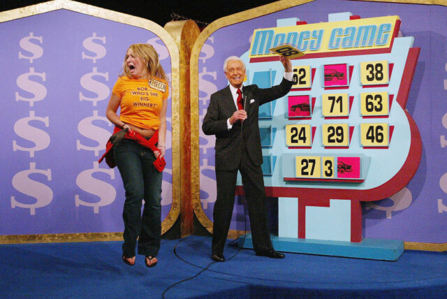 Bob Barker standing with a contestant on 'The Price Is Right'