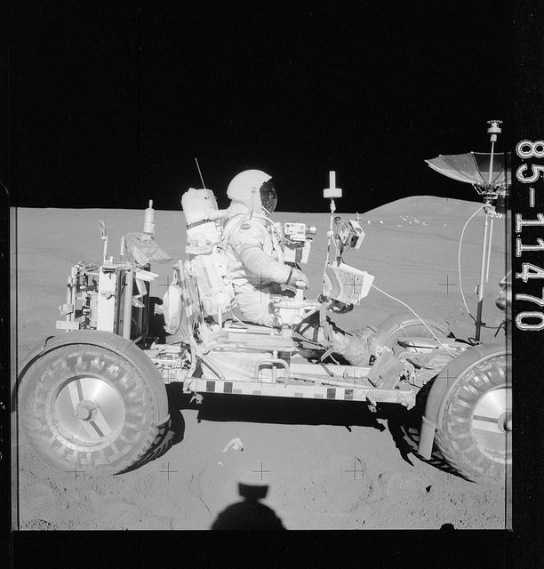 Astronauts driving on the Moon. Photo by Project Apollo Archive CC BY 2.0