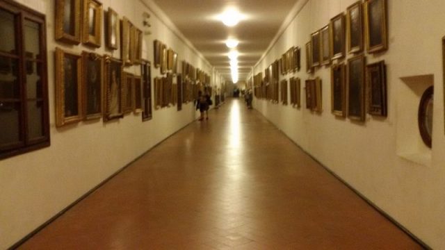 Inside view of the Vasari Corridor from the Uffizi Gallery toward Palazzo Pitti. Photo by Diomidis Spinellis CC BY-SA 4.0