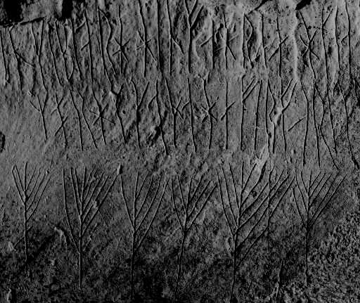 12th century runes carved inside the cairn. Photo by Islandhopper CC BY 2.5
