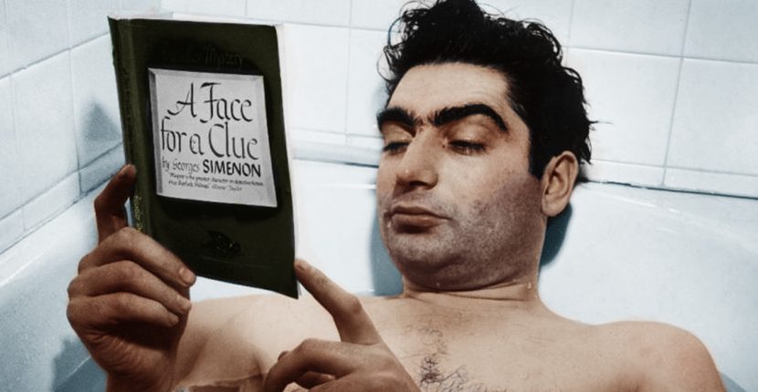 Hungarian-born photographer and journalist Robert Capa (1914 - 1954) reads George Simenon's 'A Face for a Clue' (also known as 'Le chien jaune') while he lies in a bathtub at the home of fellow photographer, Myron Davis, New York, New York, October 1942. (Photo by Myron Davis/The LIFE Images Collection/Getty Images)