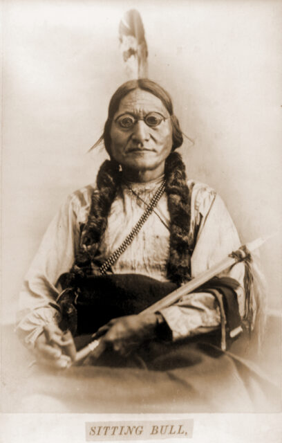 Sitting Bull holding a calumet