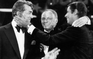 Singers Dean Martin, Frank Sinatra and Jerry Lewis perform during the 1976 telecast of The Jerry Lewis MDA Telethon