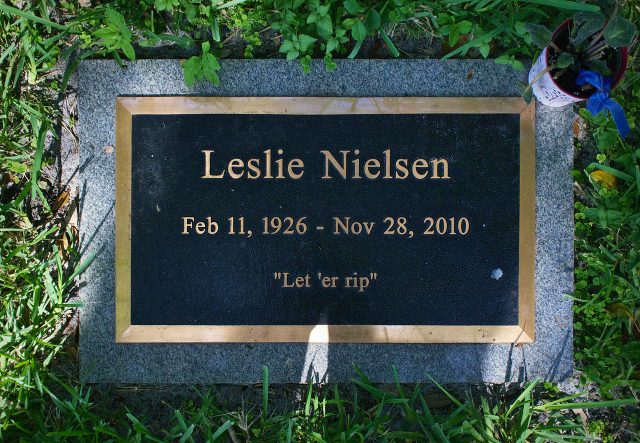 Leslie Nielsen’s gravestone bearing his epitaph, a final reference to his favorite practical joke, a fart machine. Avhell – CC BY-SA 3.0
