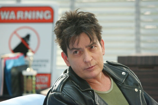 Charlie Sheen reprising the role of "Guy in police station" on The Goldbergs