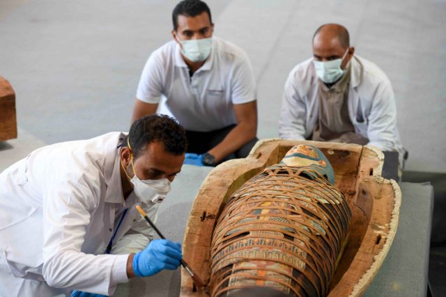 The sealed wooden coffins, unveiled on site amid fanfare, belonged to top officials of the Late Period and the Ptolemaic period of ancient Egypt. Getty