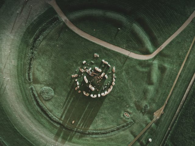Aerial view above Stonehenge, as the shadows are cast making it look like a sundial.