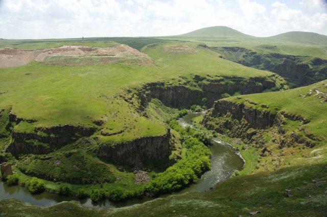 The Virgin’s Castle, visible at center, on cliffs above the Akhurian River