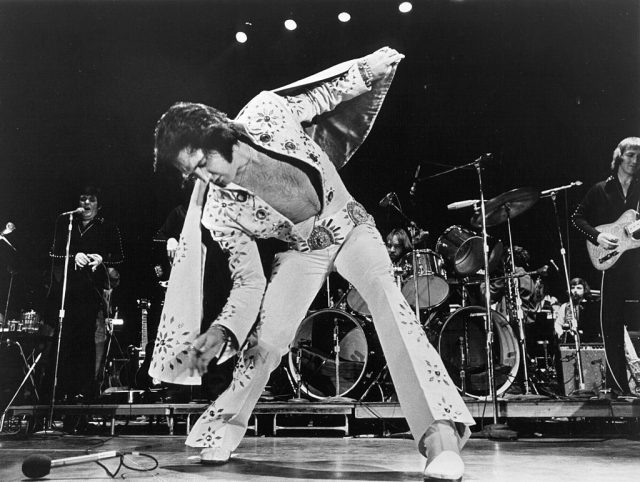 1972: Rock and roll singer Elvis Presley performs on stage in 1972. (Photo by Michael Ochs Archives/Getty Images)
