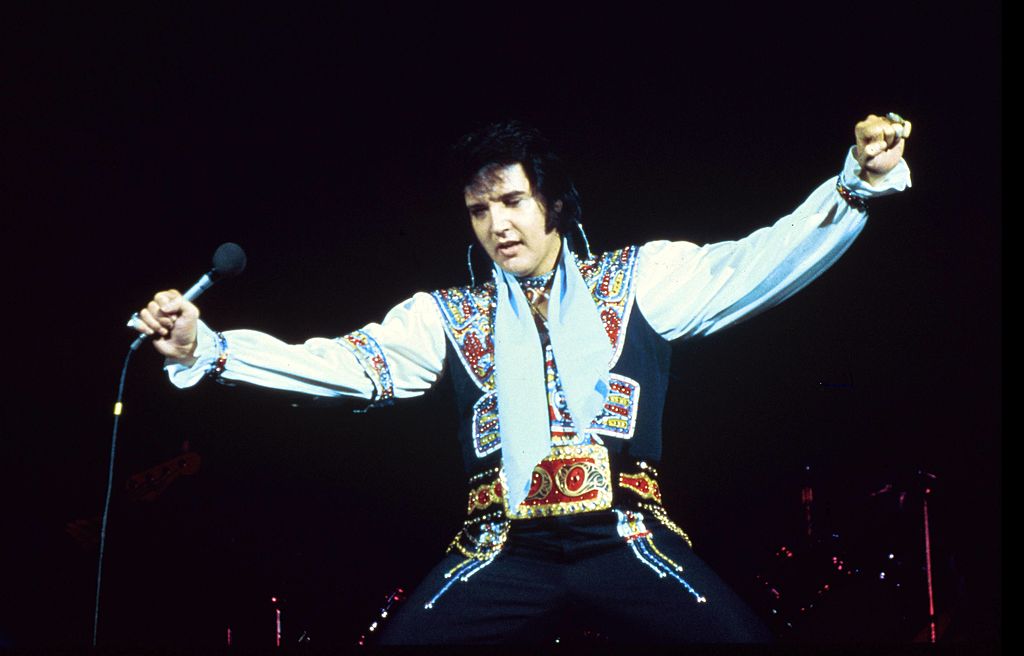 UNITED STATES - JULY 20:  NASSAU COLISEUM  Photo of Elvis PRESLEY, performing live onstage  (Photo by Steve Morley/Redferns)