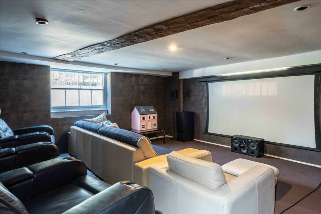 The cinema is located on the lower ground floor, along with a games room, wellness suite and a wine cellar. Image credit: Knight Frank
