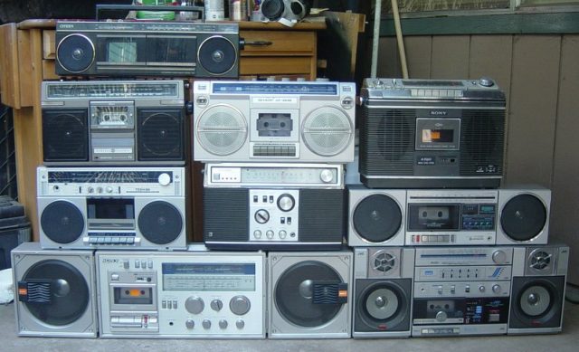 An assortment of radio-cassette players, aka “ghetto-blasters” or “boomboxes”. Tom Meyer – CC BY 2.0