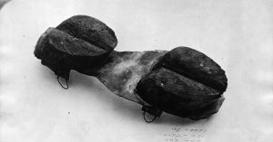 Black and white image of cow shoes