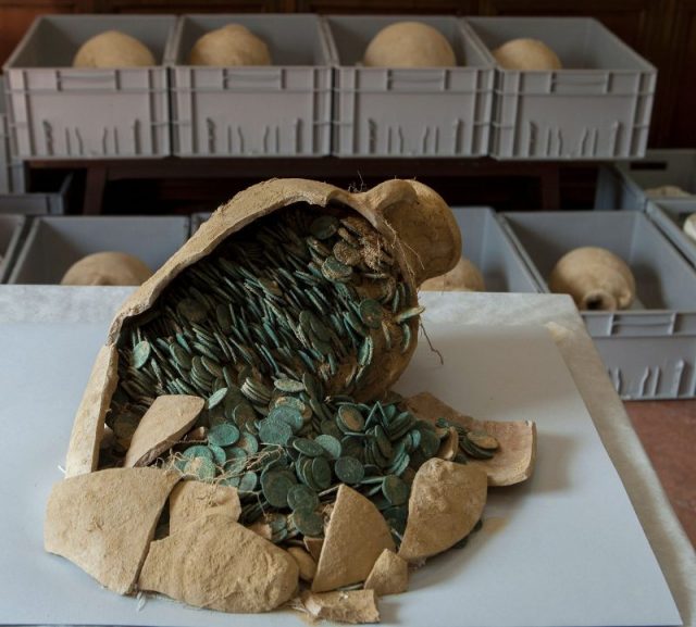 A Roman amphora filled with coins found in Spain.